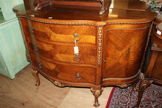 Walnut and parcel-gilt serpentine sideboard